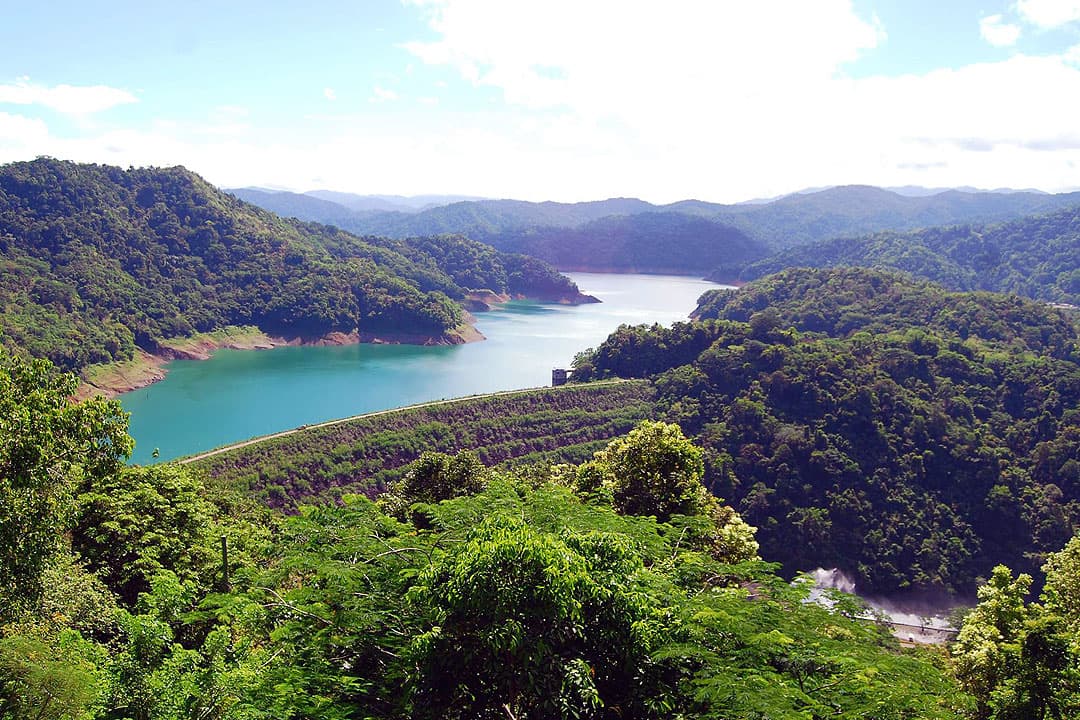Angat Dam and reservoir surrounded by lush mountains
